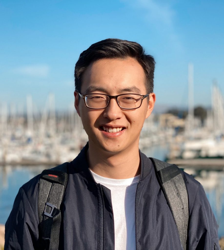 Portrait of Sheng Li at a marina